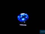 a blue sapphire stone on a black background