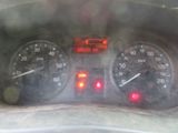 a close up of the dashboard of a car with the speedometer on