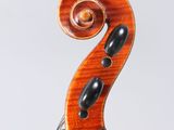 a close up of a violin ' s bow on a white background