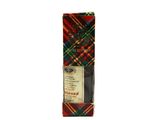 red and green plaid necktie with a label on it