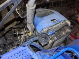 an image of a motorcycle that has been left in the garage