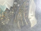 une photo d'un tableau représentant une femme en robe