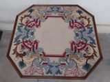a picture of a table with a floral design on it