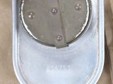 a metal object that is sitting in a metal container