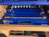 a blue tool box with tools inside of it