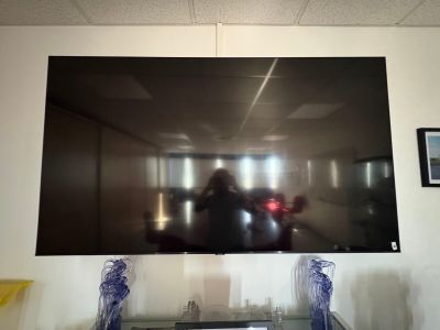 a large flat screen tv hanging on the wall