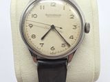 an image of a wrist watch with a black leather band