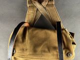 a close up of a backpack on a table with a strap