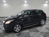 la photo d'une voiture noire garée dans un garage