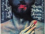 tootsie magazine cover with a man holding a red lipstick