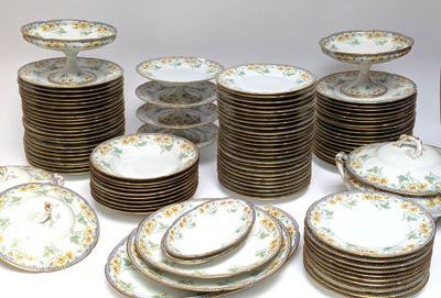 a lot of plates that are sitting on a table