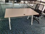 tables and chairs in an office with glass walls and blue carpet
