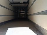 an image of a moving truck with the door open