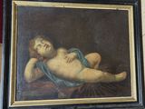 painting of a naked woman laying on a bed with a blue blanket