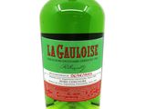 the bottle is full of a green liquid with a black cap