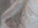 a painting of a woman ' s face on a chalk board