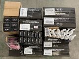 several boxes of assorted items sitting on top of a floor