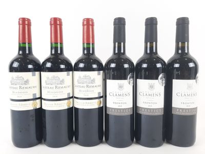 six bottles of red wine lined up on a white surface