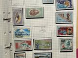 a picture of a notebook with stamps on it