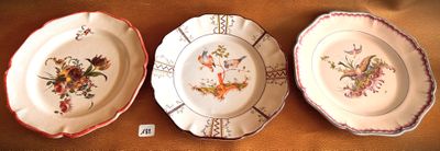 three plates that are sitting on a table