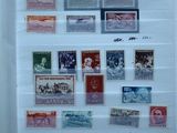 a picture of a picture of a collection of stamps on the wall