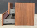 an image of a bed with a drawer in it