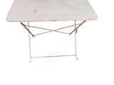 an image of a white table with a metal frame on it