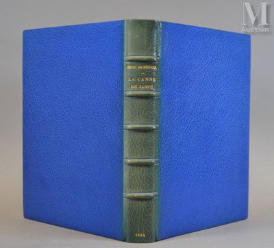a close up of a book with a blue cover on a table