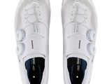 the white shoes are lined up and ready to be worn