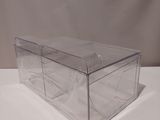 a clear plastic box sitting on top of a white table