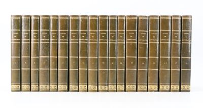 a set of twelve books on a white background