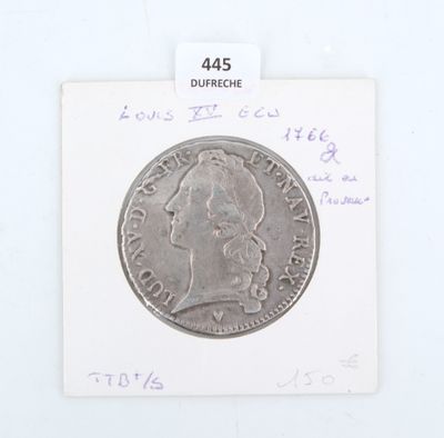 une pièce d'argent sur laquelle figure une femme