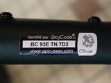 a close up of a bicycle with a sticker on it