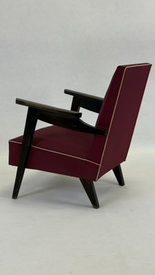 Fauteuil en simili cuir bordeaux et bois H.