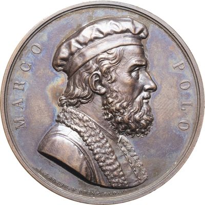 un gros plan d'une pièce de monnaie sur laquelle figure un homme coiffé d'un chapeau