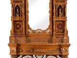 a wooden table with a mirror on top of it