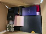 a box with many different types of electronic devices in it