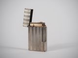 an image of a lighter that is sitting on top of a table