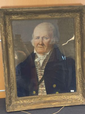 portrait d'un vieil homme en costume-cravate, dans un cadre doré