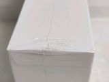 a close up of a white box on a table