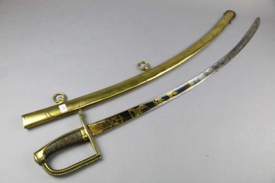 une paire d'épées ornées de décorations en or et en argent