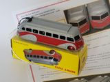 a toy bus that is sitting on top of a box
