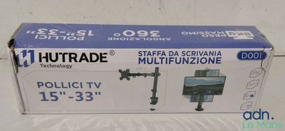 the box is open on the table with the tv in it