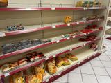 a lot of food on the shelves in the store