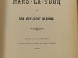 un vieux livre dont le titre, « Mars - La - Afour », est écrit en français
