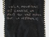 a black bag with writing on it sitting on top of a table