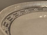 a glass plate that is sitting on a table