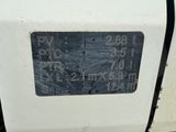 a sign on the side of a white truck