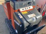 an image of a machine that is parked in the driveway