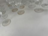 many empty wine glasses on the table ready to be served